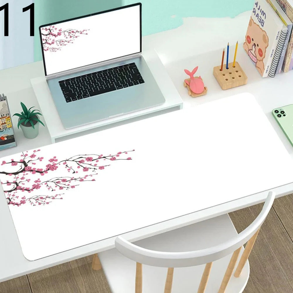 Large gaming mouse desk mat showing printed design on rubber surface with size options up to 400x900mm
