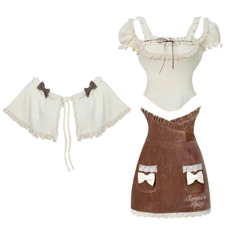 Apricot knitted top with brown hip skirt and apricot shawl three piece set in sizes S, M, and XS