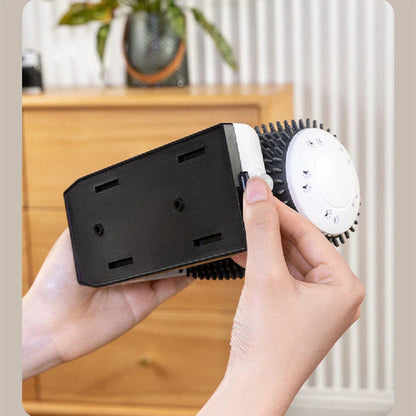 A wall-mounted, self-grooming brush for cats with soft bristles and a compact, white design.