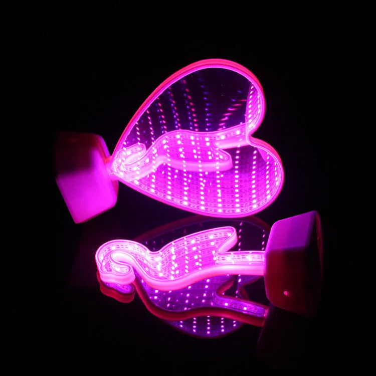 Double-sided LED love tunnel light with rose red illumination on a plastic base.