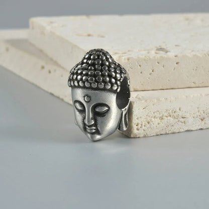 Personalised stainless steel hollow skull Buddha earrings showing 1.5 cm diameter and electroplated colour options