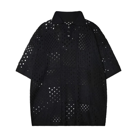 Knitted polo shirt short sleeve in solid black colour showing loose fit design