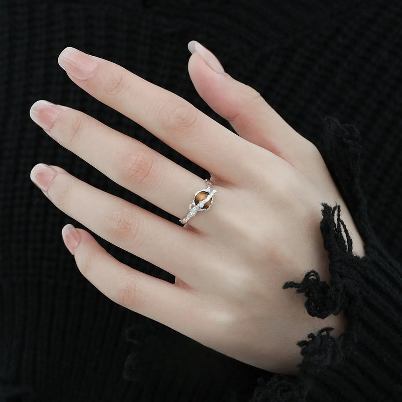 Silver saturn open ring in white gold colour with adjustable opening, a cool all-match design featuring tigereye and electroplated finish for women's jewellery and fashion accessories