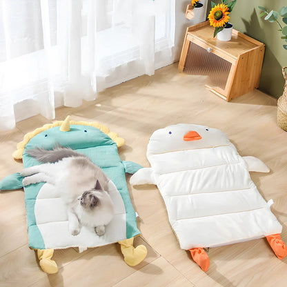 Detachable cooling cat bed with ice pad in white duck pattern, showing separate components and reinforced stitching