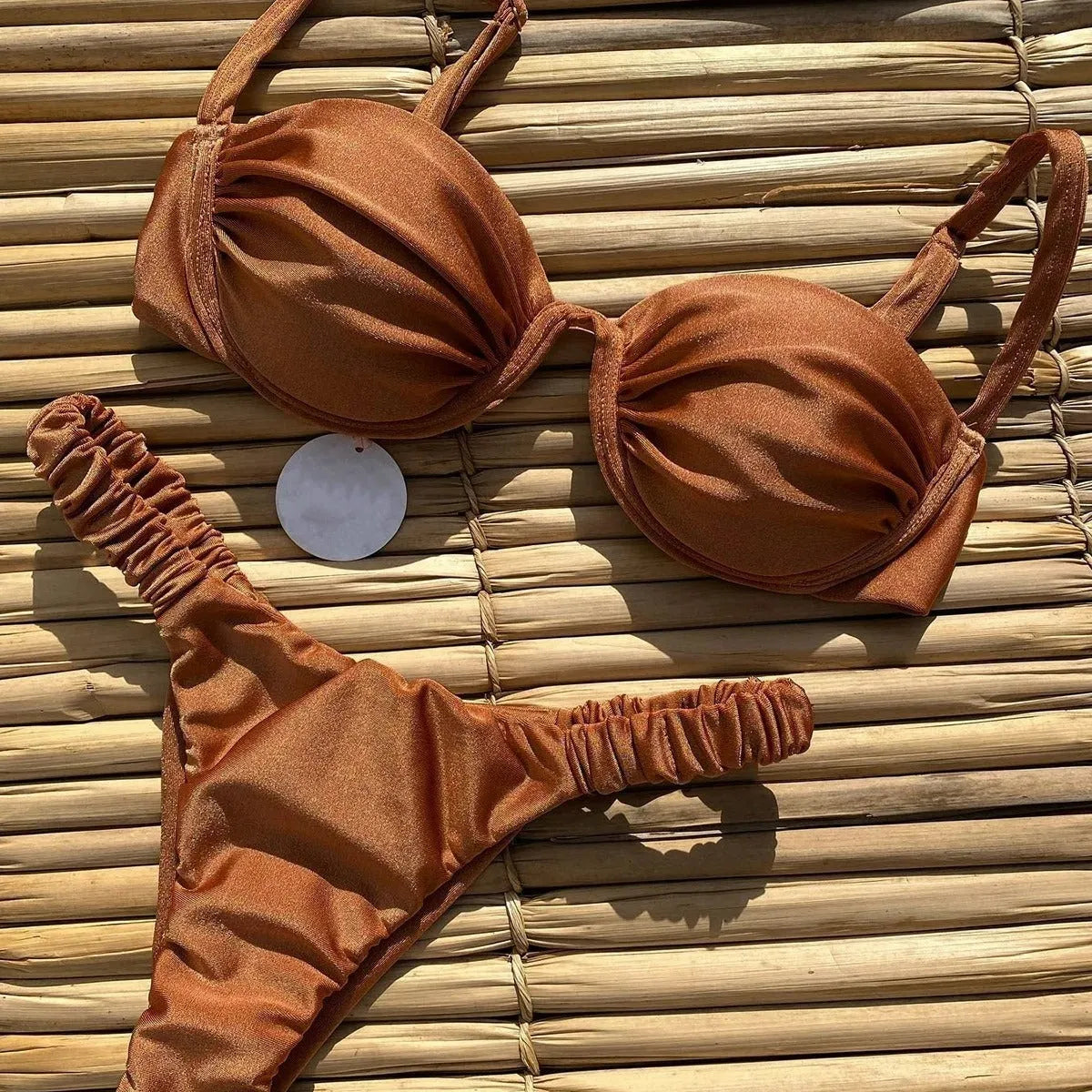 Women's underwire bikini swimsuit with split briefs design in khaki colour showing spandex lining construction