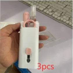 Multifunctional white cleaning pen kit open to show silicone tip, brush, keycap puller, and spray bottle for electronics.