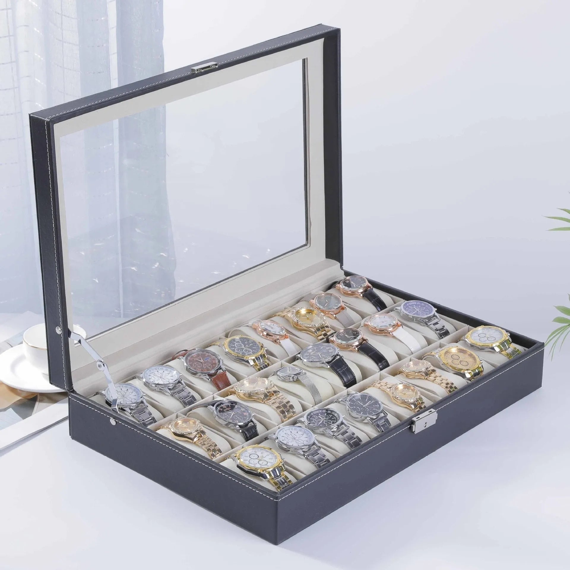 Grey high-grade leather watch storage box with transparent lid showing multiple watch compartments.