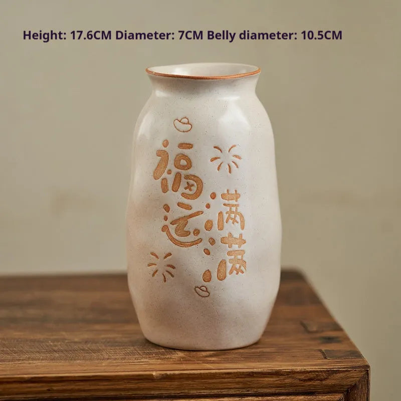 Hand-painted Chinese ceramic vase with carved detail on a desk, shown in Double Happiness colour design.