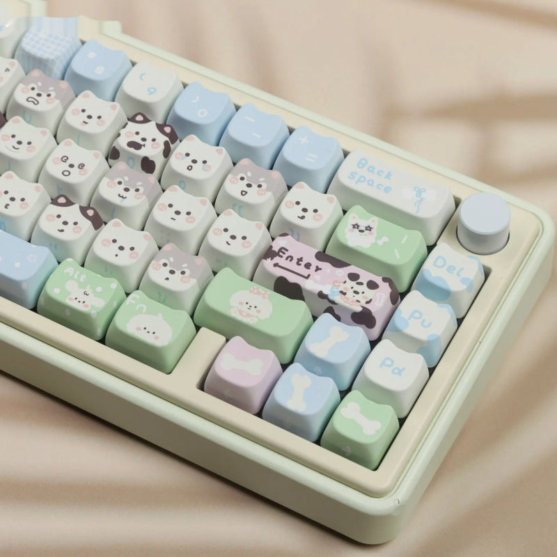 Full set of PBT sublimation key caps for mechanical keyboards, featuring a cute cat and puppy animal theme design in a 145-key set that fits most universal key layouts.