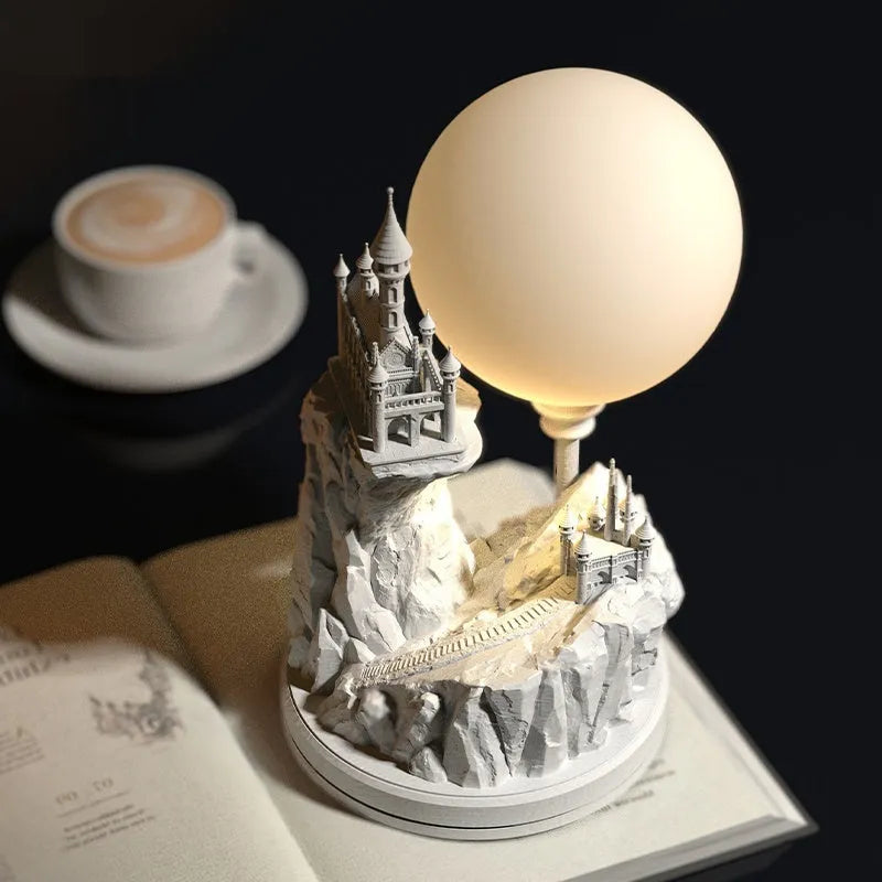 White composite gypsum desk lamp with a wire control switch on a table.