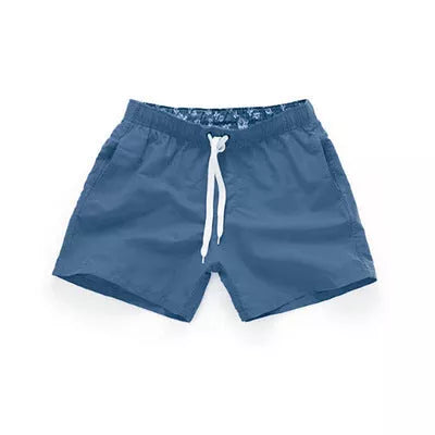 Men's summer surf shorts in various colors, made from 100% polyester for quick drying and durability