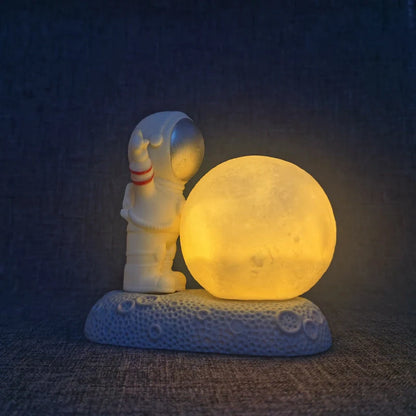 Modern astronaut night lamp with color-changing LED and detachable design