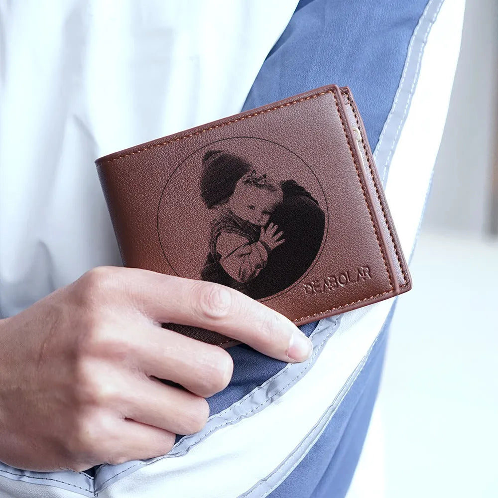Men's brown leather wallet with a zip closure, presented in individual packaging.