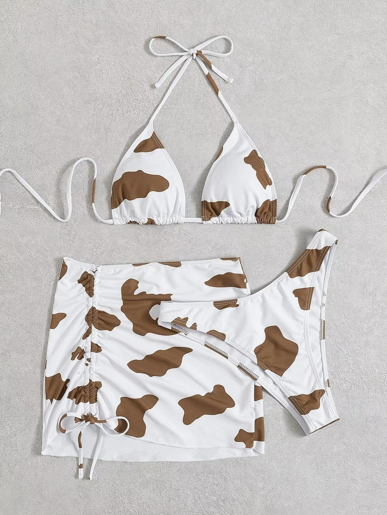 Women's cow print sleeveless swimsuit in coffee color, sizes S to 2XL