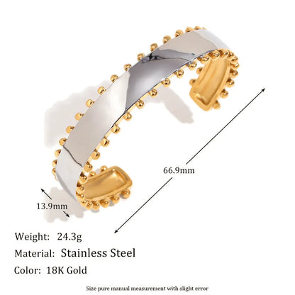 Gold electroplated stainless steel earrings, necklace, and bracelet set with geometric shapes and round ring elements