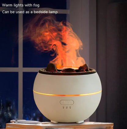 White flame aroma diffuser humidifier with round shape on wooden desk