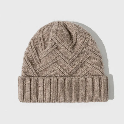 Wool knitted women's hat with dome crown in ankela red colour showing totem pattern details