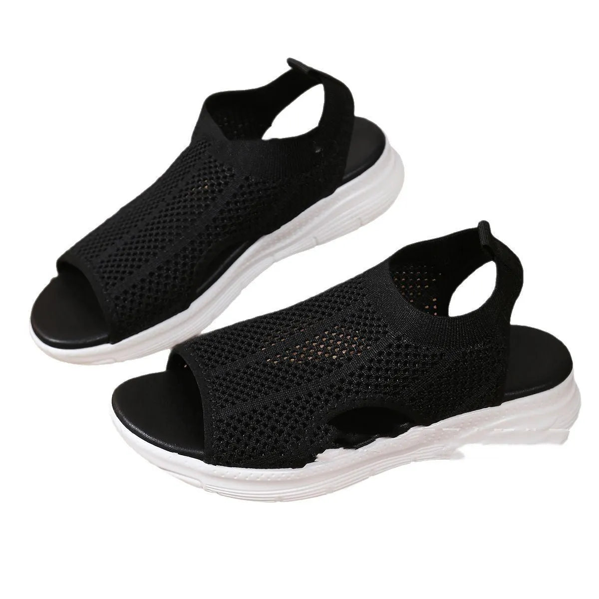 Women's platform sports sandals in black with mesh lining and a flat toe rubber sole.