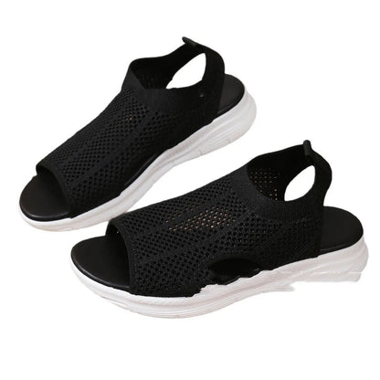 Women's platform sports sandals in black with mesh lining and a flat toe rubber sole.