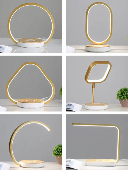 Modern bedside lamp with wireless charging pad and adjustable LED lighting in gold finish