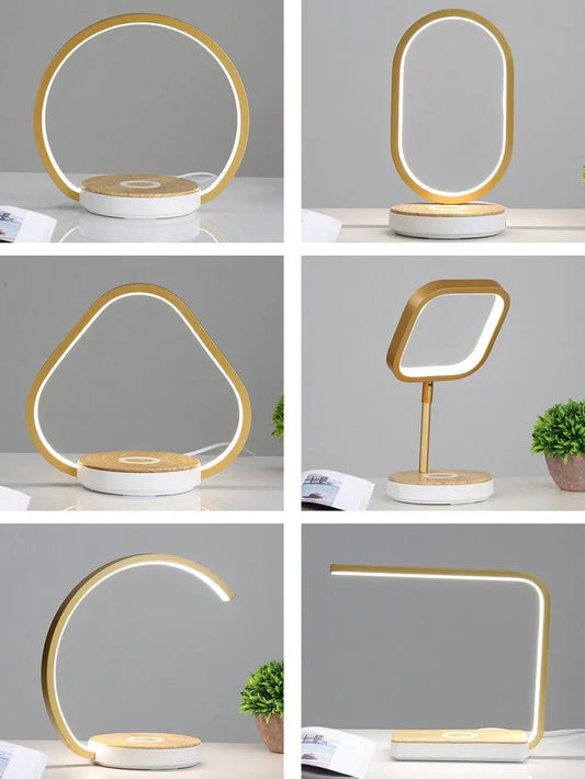 Modern bedside lamp with wireless charging pad and adjustable LED lighting in gold finish