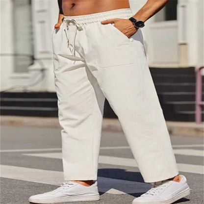 Men's straight-leg linen trousers in apricot colour with elastic waistband