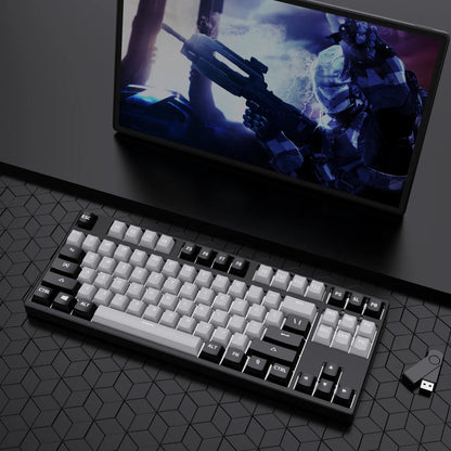 87-key mechanical keyboard with two-tone coloured keycaps on metal case