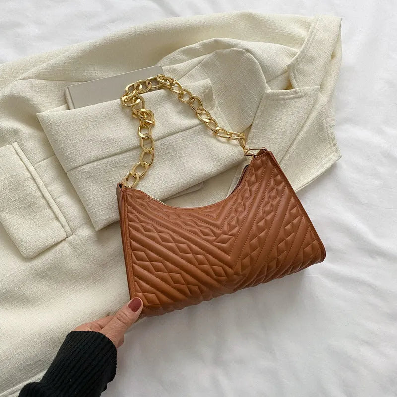 Brown pleated chain baguette shoulder underarm bag with adjustable strap and soft carry handle