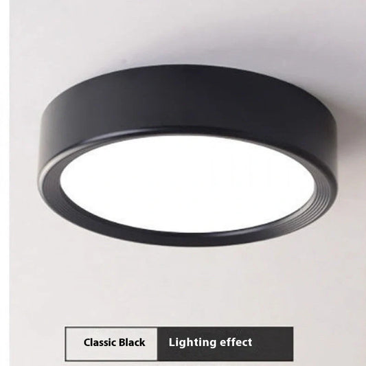 Ultra-thin 1.5cm LED surface mounted downlight in black shell with adjustable colour temperature lighting