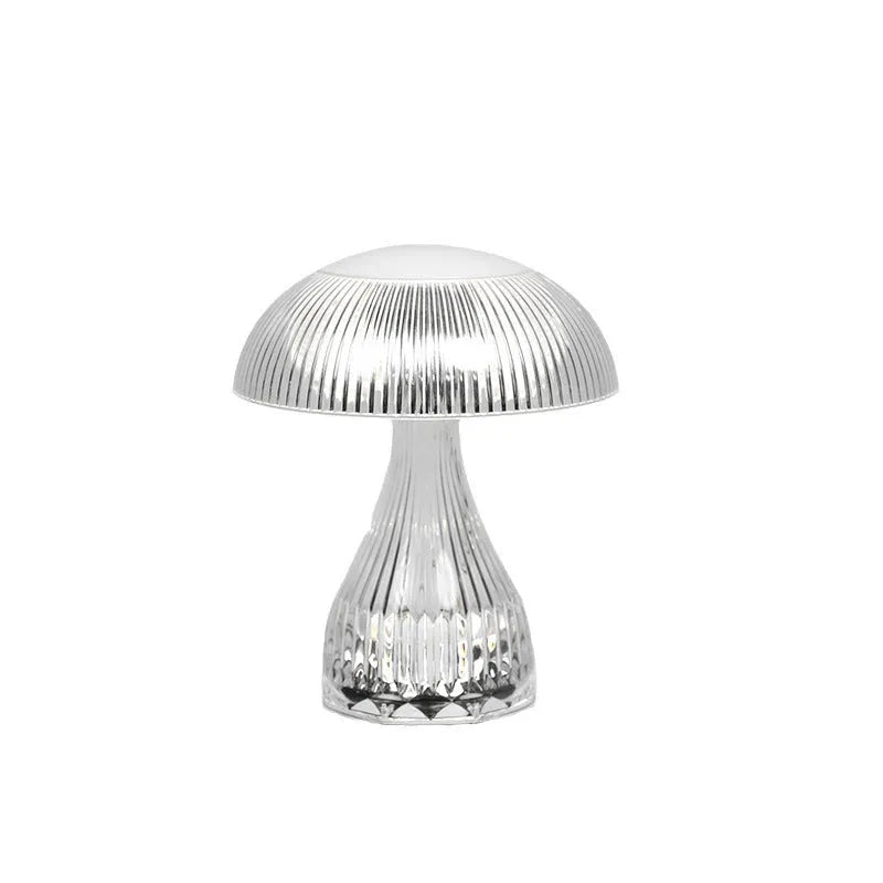 USB rechargeable acrylic table lamp with three colour changing modes on a surface.