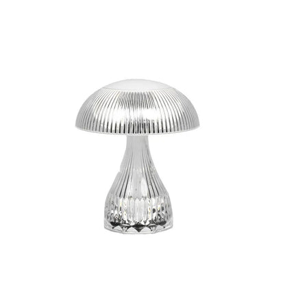 USB rechargeable acrylic table lamp with three colour changing modes on a surface.