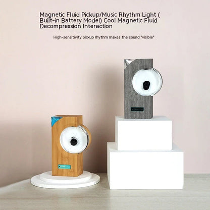 A magnetic fluid speaker that dances to the rhythm of music, creating a mesmerizing visual display