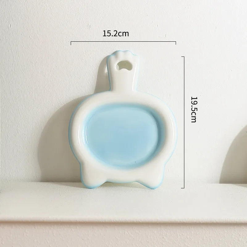 Ceramic cat bowl in blue colour with shallow mouth design for pet food and water.