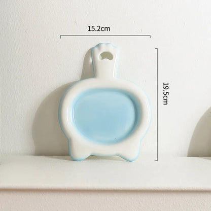 Ceramic cat bowl in blue colour with shallow mouth design for pet food and water.