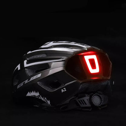 USB charging bicycle helmet with integrated taillight in bright colors for enhanced safety