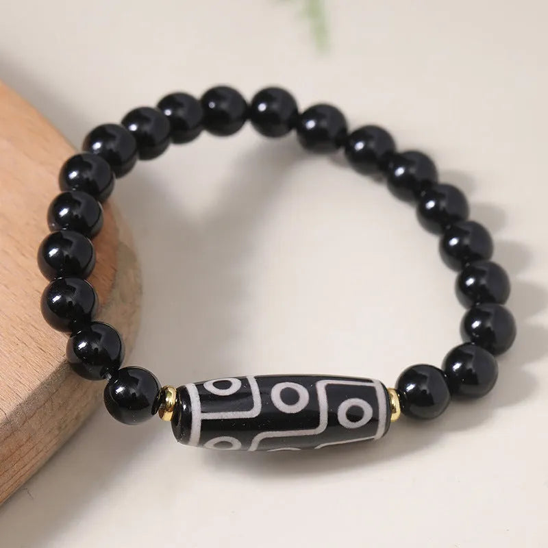 Obsidian agate dzi bead Tibetan bracelet with ethnic pattern on wrist