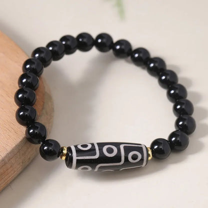 Obsidian agate dzi bead Tibetan bracelet with ethnic pattern on wrist