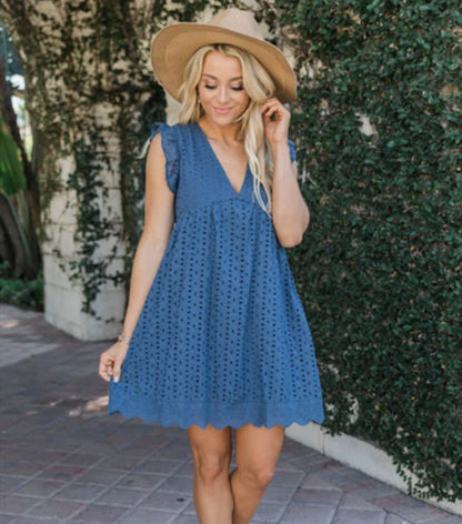 A sleeveless summer dress with a unique jacquard design, lace details, and pockets in various colors