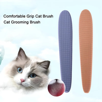 Grey and pink cat grooming comb with tongue massage design and dual-ended narrow and wide sections