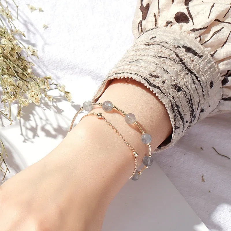 Women's electroplated crystal bracelet with moonstone charm and double copper tube design