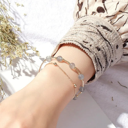 Women's electroplated crystal bracelet with moonstone charm and double copper tube design