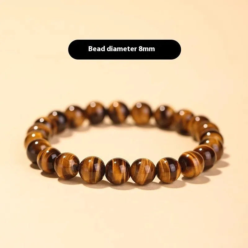 Single-circle beaded Buddha bracelet with tigereye Dzi stone, showing bead size options.