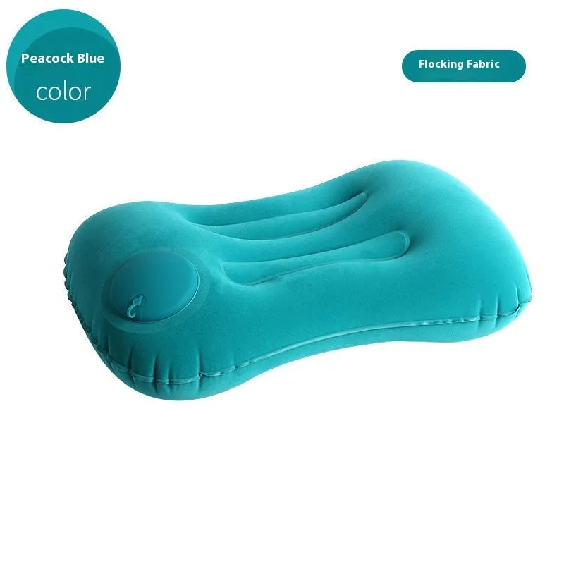 Grey inflatable travel pillow with flocking surface, shown deflated and inflated to 45x30x13cm size.