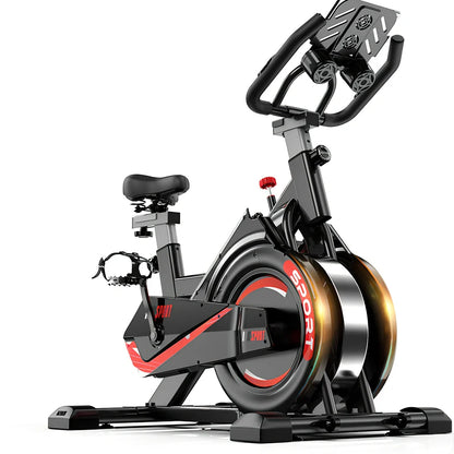 Black upright spinning bike with infinite resistance display for silent home fitness tracking distance and calories