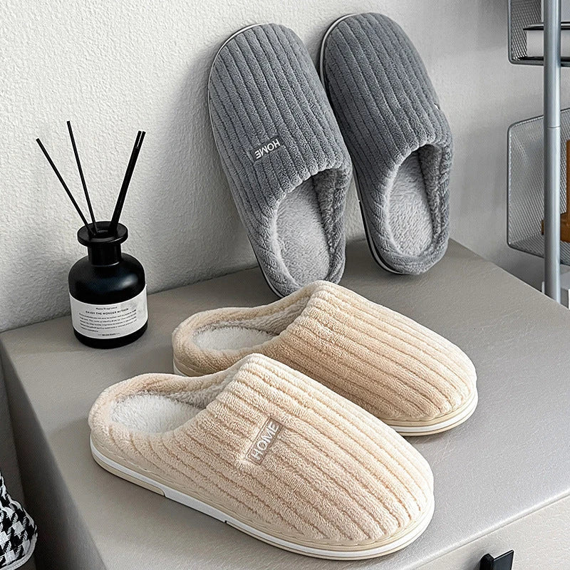 Cozy cotton slippers in various colors, featuring a soft, plush lining and non-slip rubber sole for indoor comfort and warmth