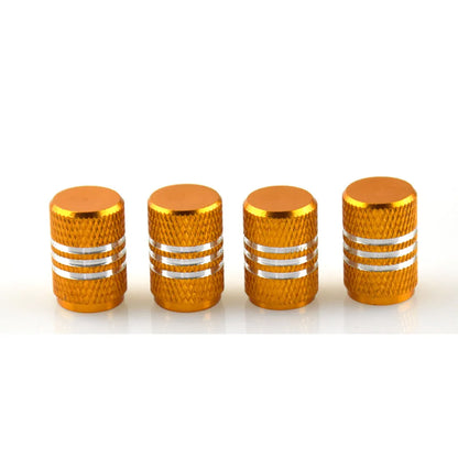 Set of stainless steel car tyre valve caps in multiple colours including black, red, blue, and gold.