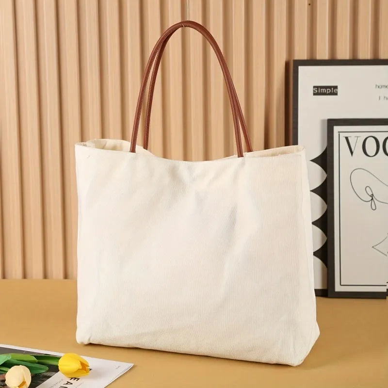 Natural cotton canvas tote bag with strong handles in beige white colour