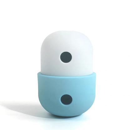 Yellow and blue silicone dog toy ball with treat opening for medium to large breed dogs