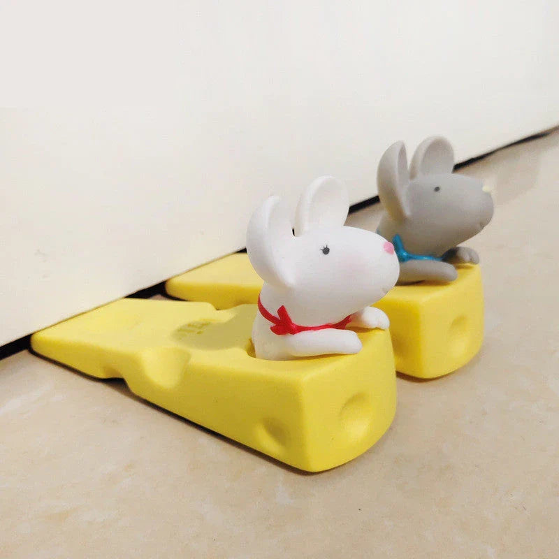 Cartoon animal door stopper in the shape of a cute mouse or squirrel, designed to keep doors open and prevent accidents