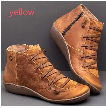 Women's casual booties with wedge heel and round toe in various colours like black and leopard print, showing rubber sole.